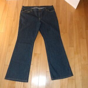 Michael Kors: dark blue denim jeans. Flare bottom w/ front and back pockets.